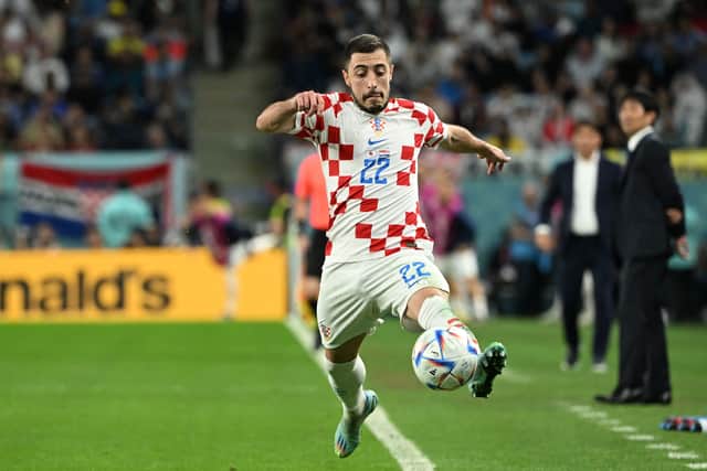 Croatia’s defender Josip Juranovic controls the ball during the Qatar 2022 World Cup round of 16 football match against Japan