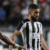 Ahly's midfielder Aliou Dieng (L) vies for the ball against Setif's forward Ahmed Kendouci (R) during the CAF Champions League Semi-Final between Algeria's ES Setif and Egypt's al-Ahly at the 5 July stadium in the Algiers suburb of Ben Aknoun 