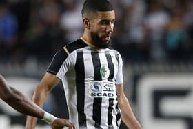 Ahly's midfielder Aliou Dieng (L) vies for the ball against Setif's forward Ahmed Kendouci (R) during the CAF Champions League Semi-Final between Algeria's ES Setif and Egypt's al-Ahly at the 5 July stadium in the Algiers suburb of Ben Aknoun 