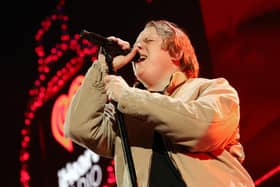 Lewis Capaldi performs onstage. (Photo by Rich Polk/Getty Images for iHeartRadio)