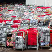 Letter and parcels pile up outside the Royal Mail centre in Bristol. Due to the postal strike along with the busy festive period lots of cages are seen outside the mail centre. Many of these parcels have been left outside for at least 17 hours.