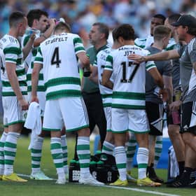 Celtic players have drinks break during the Sydney Super Cup match between Celtic and Everton at Accor Stadium 