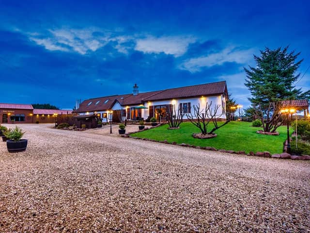 Look at this rare opportunity to own ten acres, a massive fitness complex including a sauna, pool, and wellbeing centres, a detached farmhouse and more.
