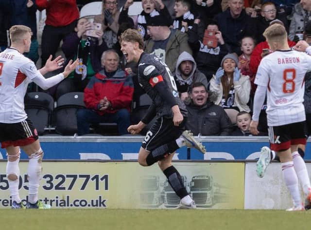 St Mirren captain Mark O’Hara wheels away in celebration after making it 2-1 against Aberdeen (Image: SNS Group)
