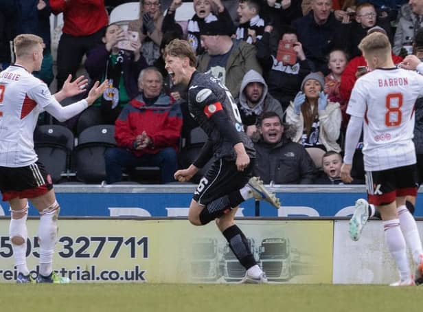 <p>St Mirren captain Mark O’Hara wheels away in celebration after making it 2-1 against Aberdeen (Image: SNS Group)</p>