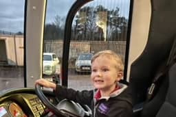 He even got to sit in the drivers seat!