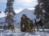 Gordon Buchanan with sled dogs in Canada’s Yukon