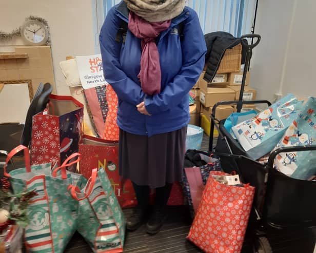 An Openreach worker with the donations at the Maryhill branch