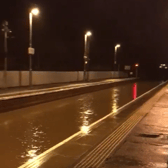 The track at Bowling Station in Glasgow was entirely submerged this morning due to heavy rain. (Pic: National Rail)