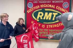 Chris Mitchell dressed as a Giant Rat in a GMB union video