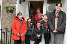 The former headteacher was visited by members of the 35th Scout group to congratulate Gillian on her MBE