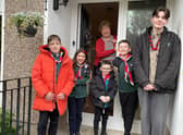 The former headteacher was visited by members of the 35th Scout group to congratulate Gillian on her MBE