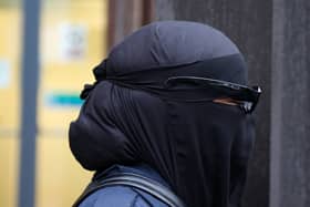 Xahra Saleem leaves Bristol Magistrates Court where she pleaded not guilty to two charges of fraud.