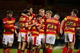 Partick Thistle players celebrate their winning goal (Image: SNS Group)
