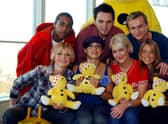 S Club 7 (L to R) Bradley Mcintosh, Paul Cattermolle, John Lee, Hannah Spearritt, Tina Barrett, Joe Omeara and Rachael Stephens pose for photographers November 15, 2001