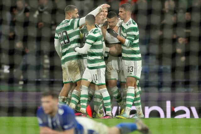 Giorgos Giakoumakis of Celtic celebrates with teammates after scoring the team's second goal