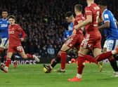 Ryan Jack of Rangers scores the team’s first goal to level the tie