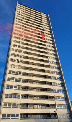 Activists set off flares and unfurled a banner from the Wyndford tower that read: ‘Homes for People Not for Profits. Save the High Flats’