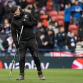 Staff work on the Hampden pitch at half-time on Sunday (Image: SNS Group)