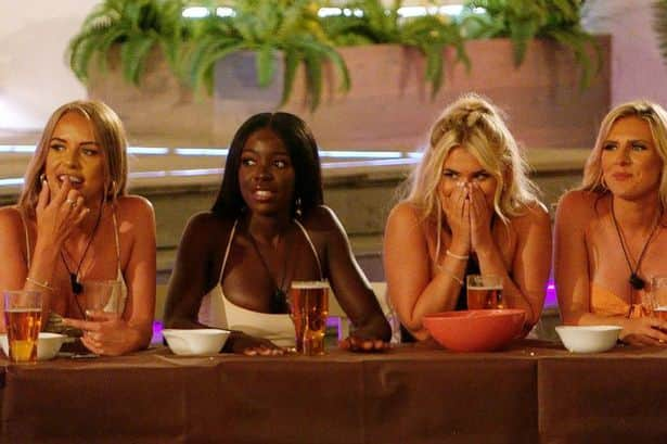 Faye Winter, Kaz Kamwi, Liberty Poole and Chloe Burrows giggling at movie night. (Photo by ITV)