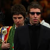 Oasis singer Liam Gallagher say brother Noel phoned him “begging for forgiveness”.