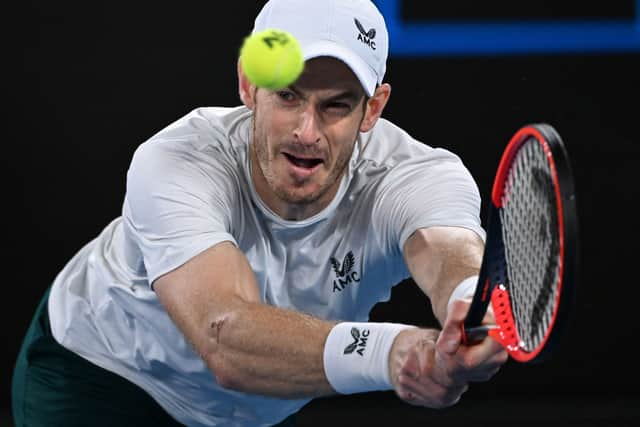 Britain’s Andy Murray hits a return against Australia’s Thanasi Kokkinakis during their men’s singles match on day four of the Australian Open tennis tournament in Melbourne on January 20, 2023. Photo by WILLIAM WEST/AFP via Getty Images)