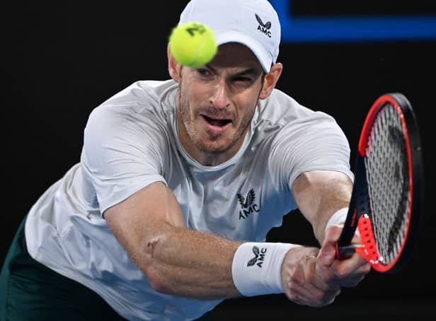 Britain’s Andy Murray hits a return against Australia’s Thanasi Kokkinakis during their men’s singles match on day four of the Australian Open tennis tournament in Melbourne on January 20, 2023. Photo by WILLIAM WEST/AFP via Getty Images)