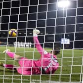 St Mirren goalkeeper Trevor Carson saves a penalty from Dundee’s Kwame Thomas during the shoot-out. (Image: SNS Group)