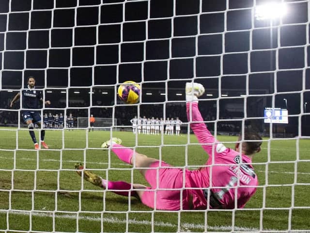 St Mirren goalkeeper Trevor Carson saves a penalty from Dundee’s Kwame Thomas during the shoot-out. (Image: SNS Group)