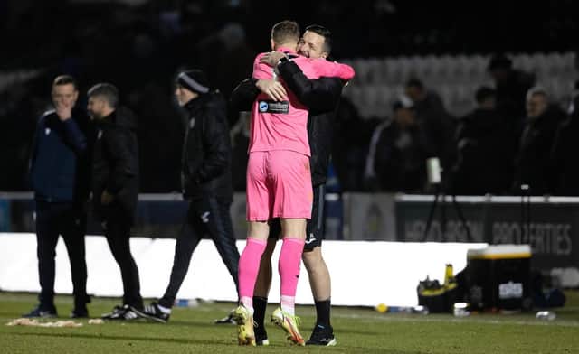 St Mirren’s Trevor Carson is congratulated by goalkeeping coach Jamie Langfield after his penalty shoot-out heroics (Image: SNS Group)