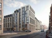 The flats are proposed to be built on a car park - although objections were raised regarding nearby listed buildings