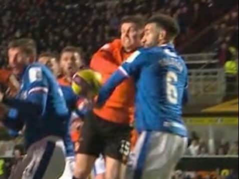 Goldson became the centre of more handball controversy against Dundee United at Tannadice