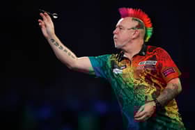 Scotland’s Peter Wright in action at Alexandra Palace in December 2021