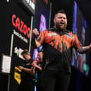 Michael Smith celebrates his victory on Night Three of the Premier League Darts in Glasgow (Image: Taylor Lanning/PDC)