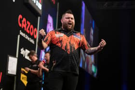 Michael Smith celebrates his victory on Night Three of the Premier League Darts in Glasgow (Image: Taylor Lanning/PDC)