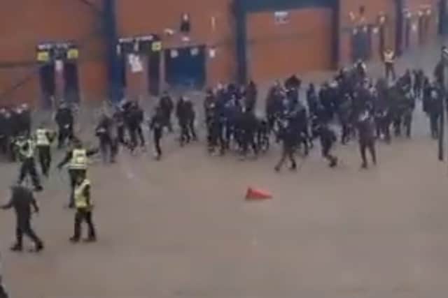 Rangers and Celtic fans clash outside Hampden Park