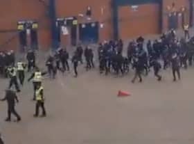 Rangers and Celtic fans clash outside Hampden Park