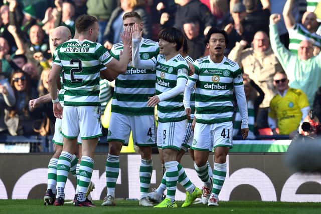 Kyogo Furuhashi of Celtic celebrates with teammates after scoring the team's second goal 
