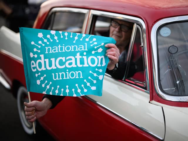 A driver supporting the NEU strike action (Photo: Getty)