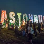 Festival-goers enjoy the atmosphere prior to the 2013 Glastonbury Festival at Worthy Farm. (Photo by Ian Gavan/Getty Images)