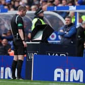 Referee Willie Collum consults VAR before awarding Rangers a penalty
