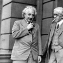 Einstein enjoying a toot on the old pipe with Archibald Young, Professor of Surgery at the University of Glasgow.