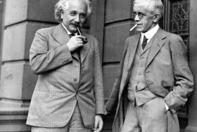 Einstein enjoying a toot on the old pipe with Archibald Young, Professor of Surgery at the University of Glasgow.