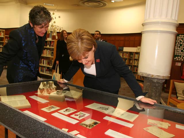 Nicola Sturgeon will donate her personal commission as First Minister to Glasgow Women’s Library - pictured here is the FM during a visit in 2015