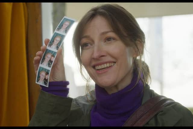 A still of Kelly Macdonald playing the Psychiatric nurse accompanying Audrey Amiss in Typist, Artist, Pirate, King