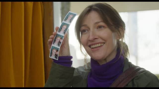 A still of Kelly Macdonald playing the Psychiatric nurse accompanying Audrey Amiss in Typist, Artist, Pirate, King