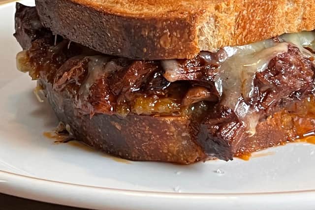 The beef shin toastie at Outlier with smoked cheddar and fennel jam on tinned loaf bread - baked fresh every day 