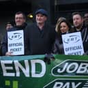 RMT general secretary Mick Lynch (centre) on an RMT picket line during January’s strike (Photo by DANIEL LEAL/AFP via Getty Images)