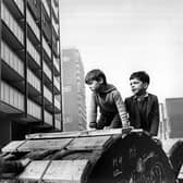 Children playing around the newly built tower blocks in the Gorbals (Photo by Albert McCabe/Express/Getty Images)