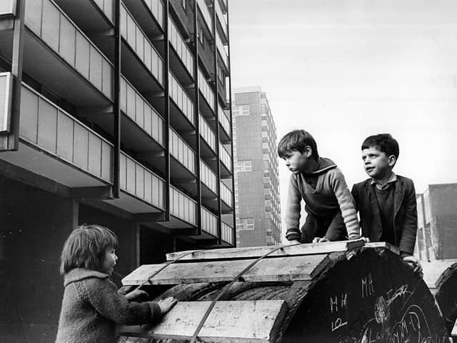 Children playing around the newly built tower blocks in the Gorbals (Photo by Albert McCabe/Express/Getty Images)